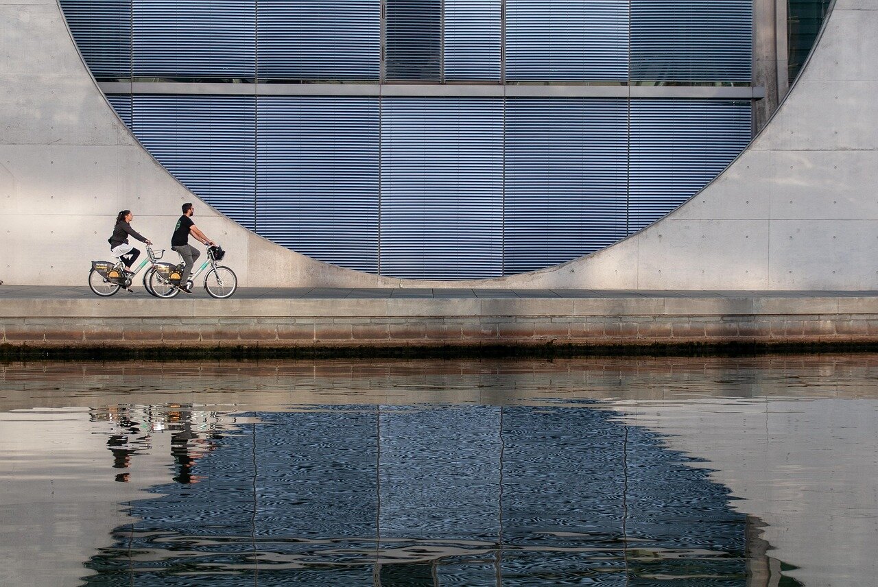 An educational workshop in progress, where participants learn about safe cycling practices and urban biking benefits