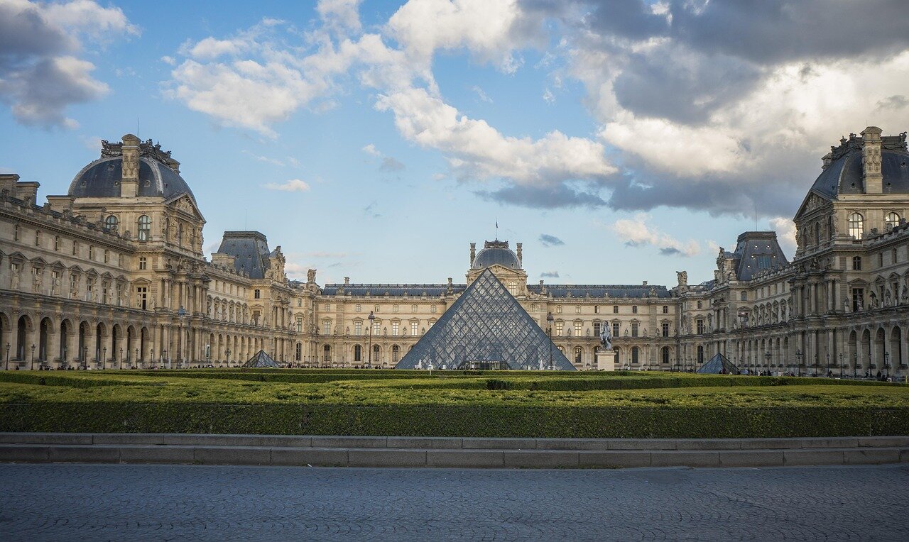 A collection of renowned artworks displayed within the Louvre, showcasing the museum's vast and invaluable cultural heritage