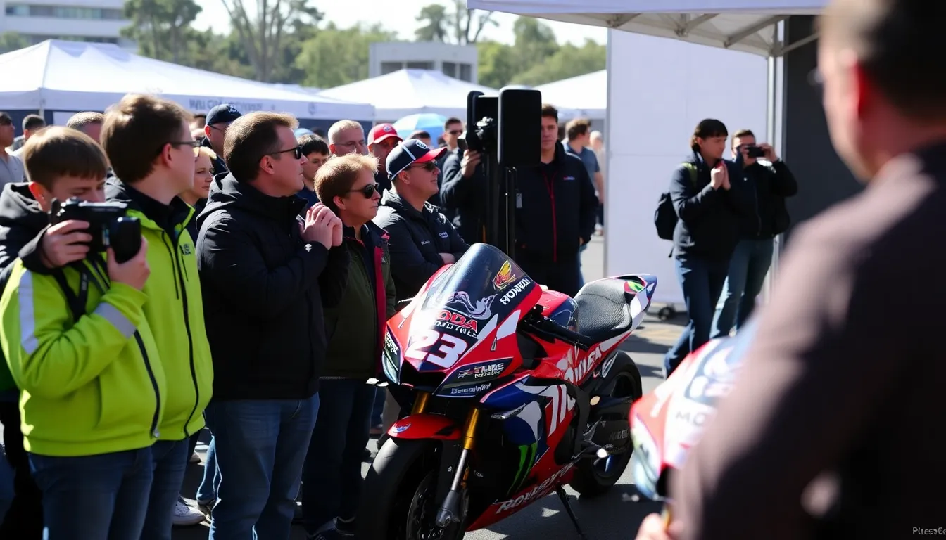 Honda MotoGP team members discuss the upcoming 2027 bike name during a team meeting, surrounded by racing memorabilia and technical equipment.