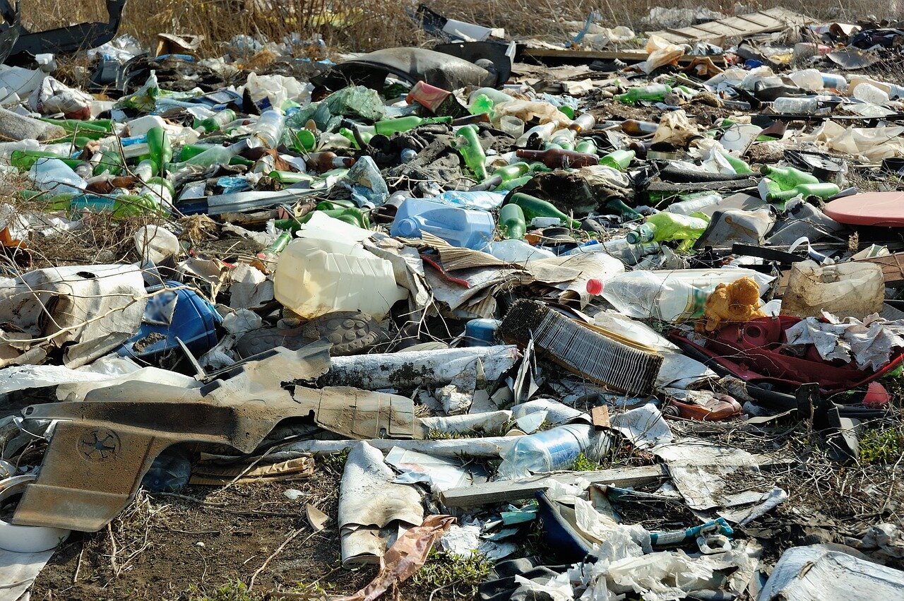A community rally advocating for stricter regulations on PFAS, highlighting public concern for environmental health