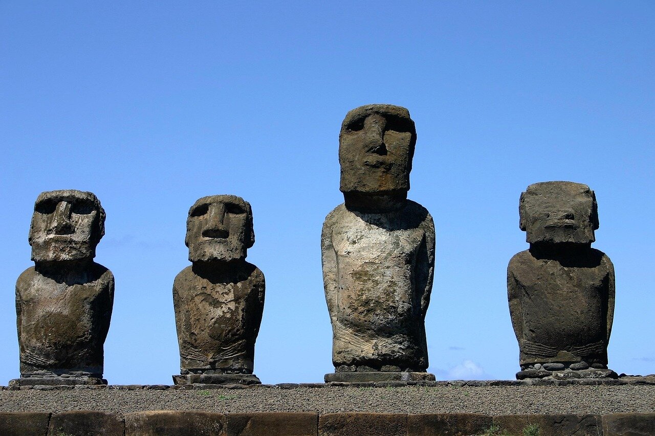 Members of the Rapa Nui community engaging in discussions about the cultural significance and preservation of the Moai statues