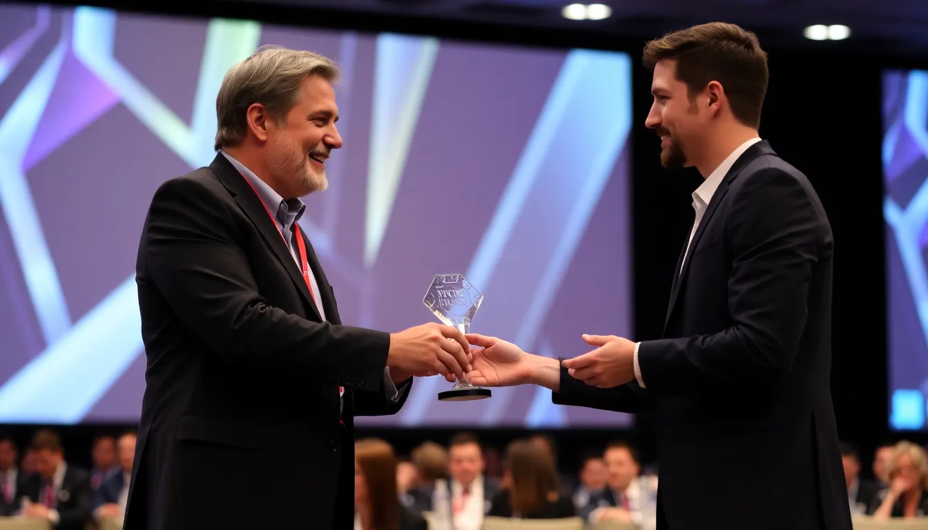Neil Druckmann and Evan Wells share a heartfelt moment on stage during the DICE 2026 reunion, celebrating Wells' Lifetime Achievement Award for his contributions to the gaming industry.