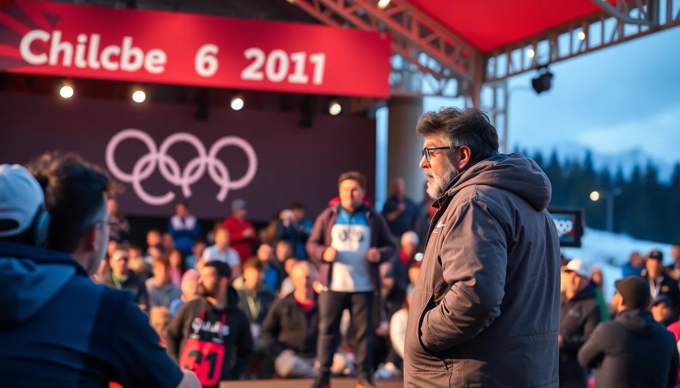 Alberto Tomba smiles and waves to fans as he walks through the Olympic venue, surrounded by banners celebrating the history of winter sports.