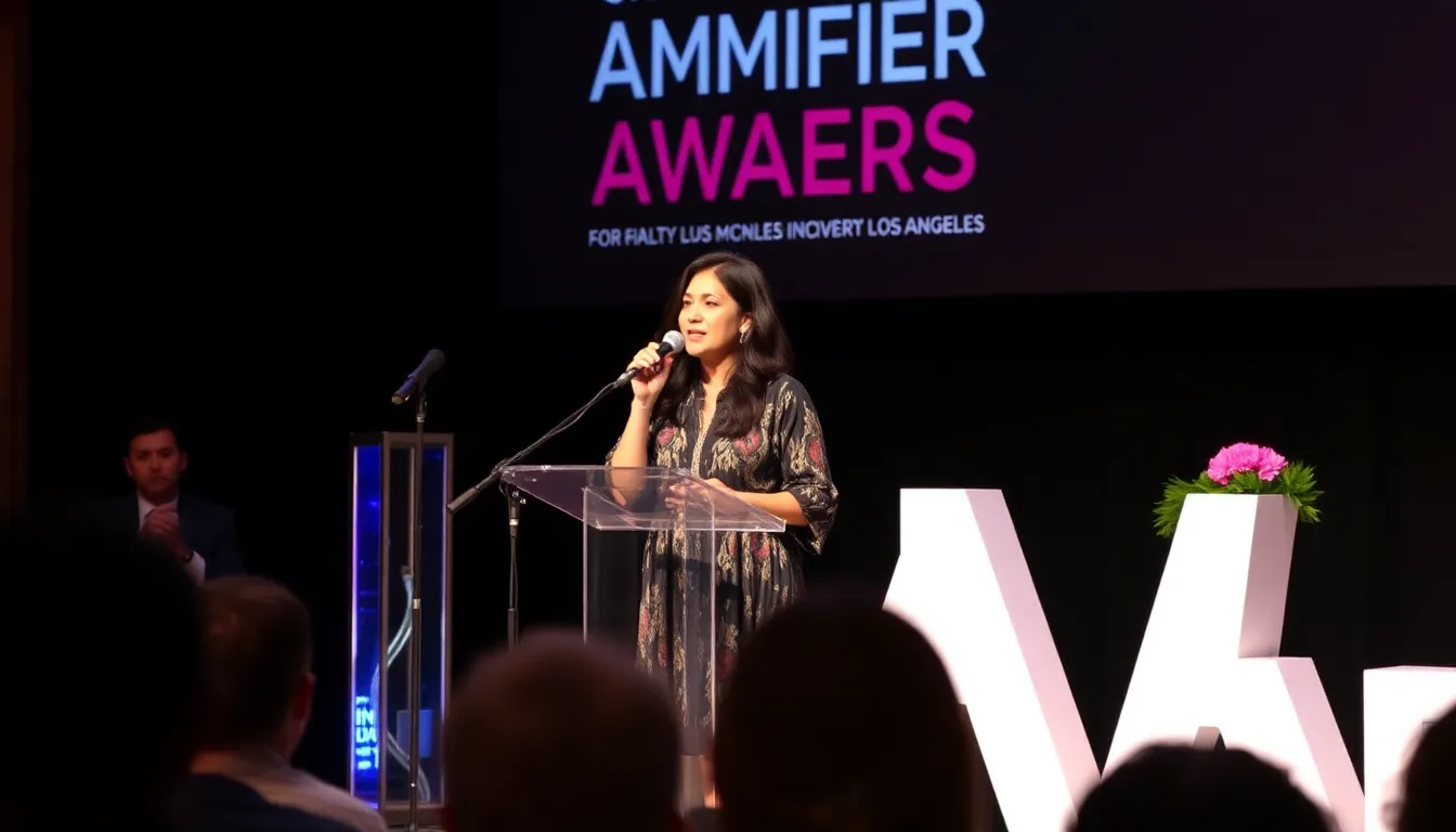 Olivia Rodrigo stands on stage, holding the Amplifier Award for Positive Change, surrounded by applause from the audience at the recognition ceremony.