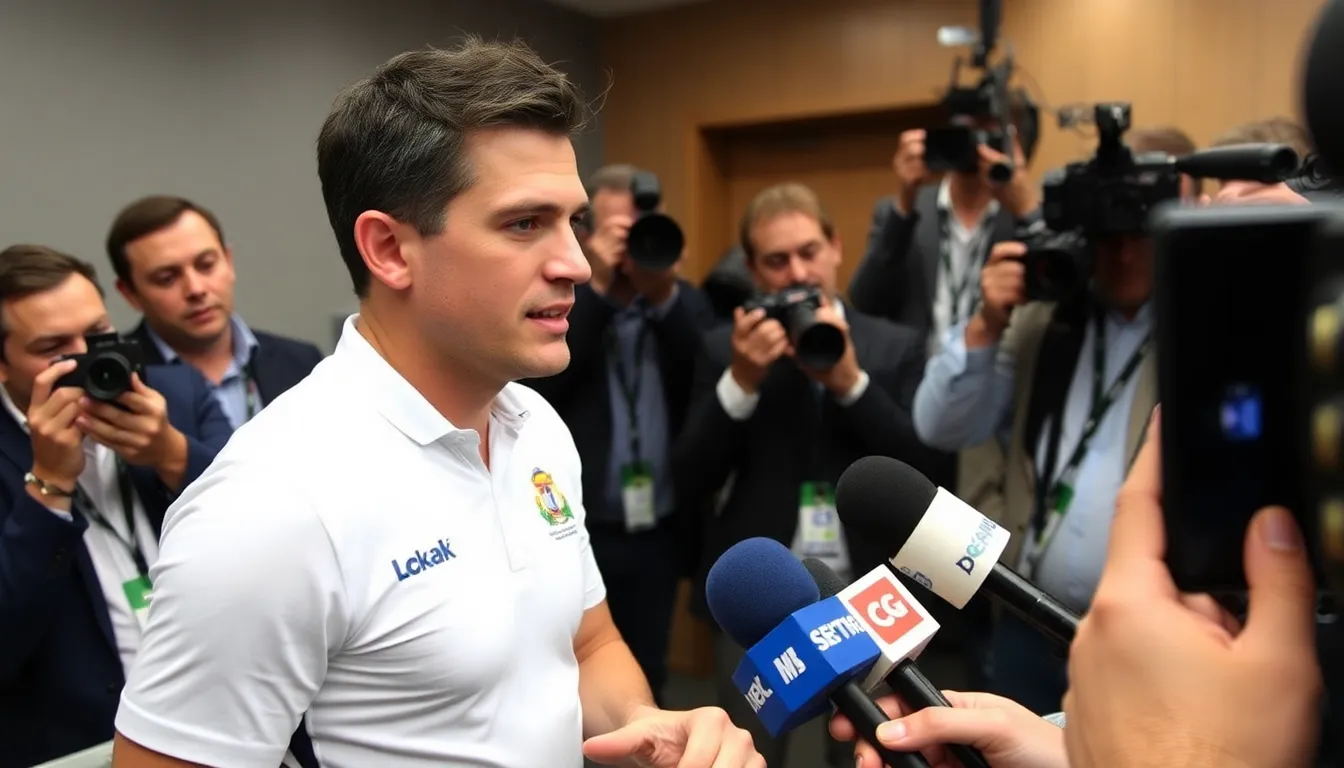 Fabio Di Giannantonio gestures passionately during a press conference, addressing his concerns about racing tactics while discussing his rivalry with Pedro Acosta.
