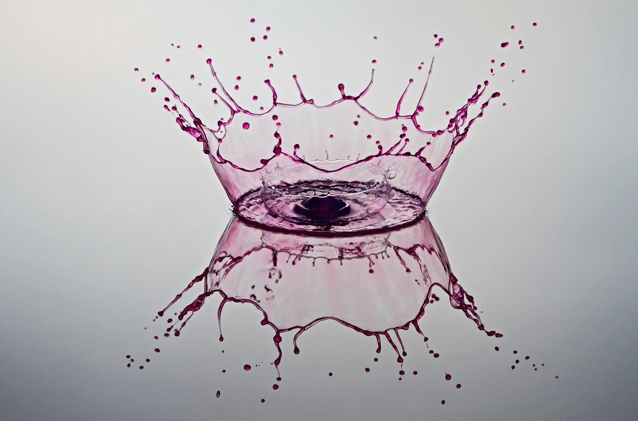 A group of women sharing their experiences with adenomyosis in a supportive environment, highlighting the emotional and psychological challenges they face