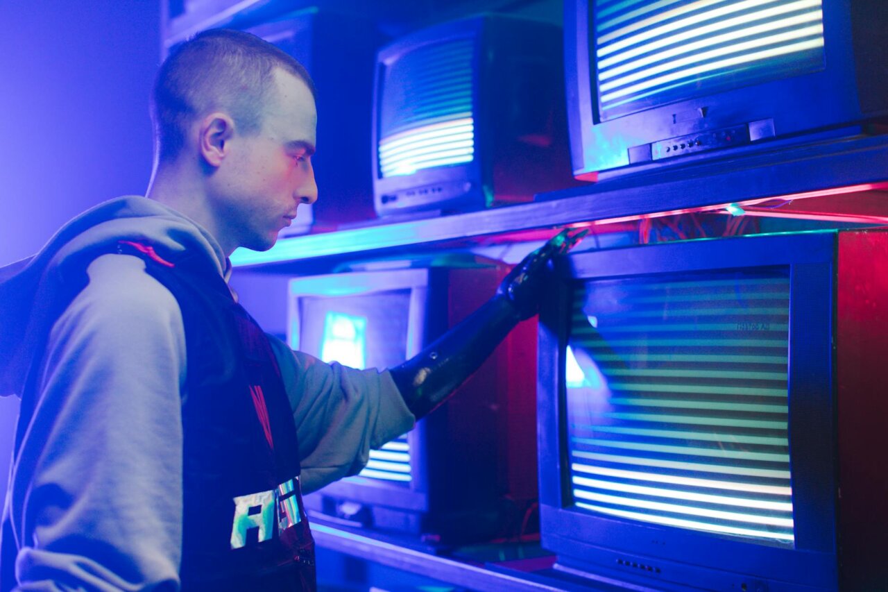 A robotic arm expertly stitches a tshirt in a modern manufacturing facility, showcasing the advancements in automated apparel production.