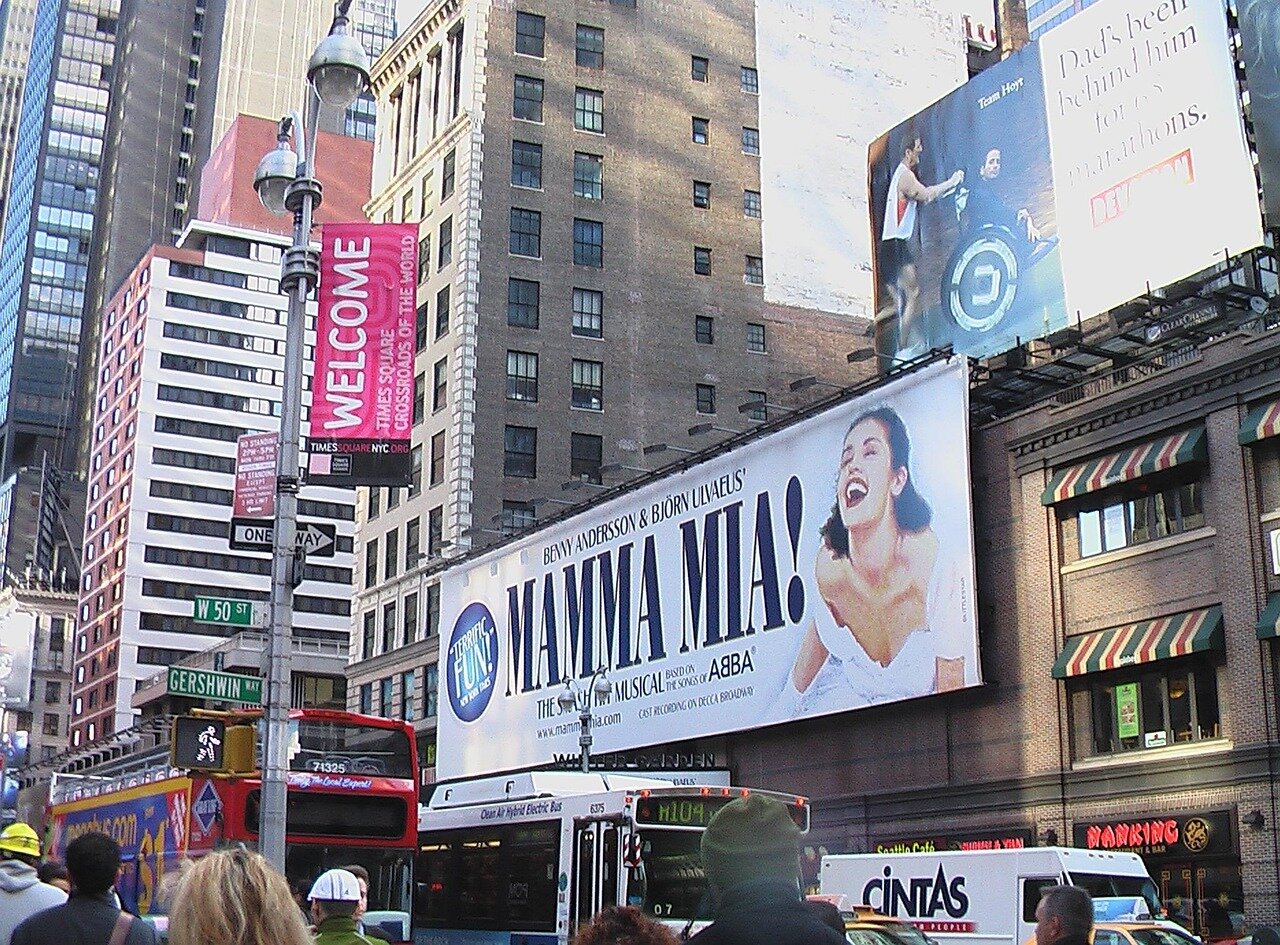 Crowds gather outside the theater as fans eagerly await the reopening of The Book of Mormon on Broadway after a threeweek closure due to a fire incident.