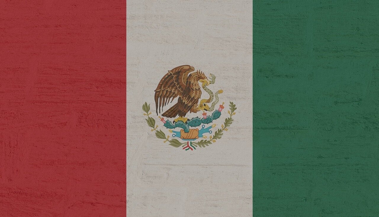 A bustling fan zone in Mexico City showcases traditional local cuisine and cultural performances, enhancing the World Cup experience for visitors
