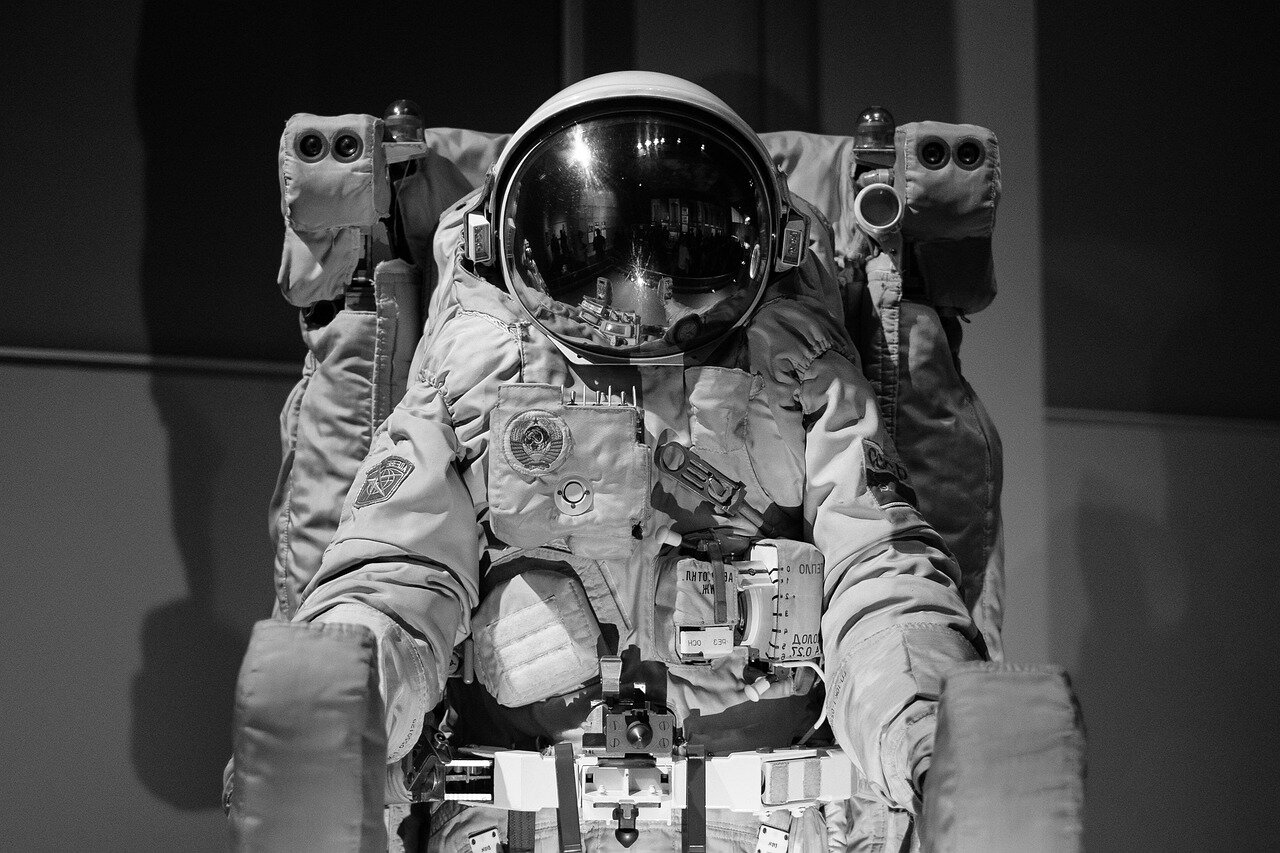 A depiction of astronauts conducting research on the Moon's surface, highlighting the potential for insitu resource utilization to support longterm human habitation and fuel future missions