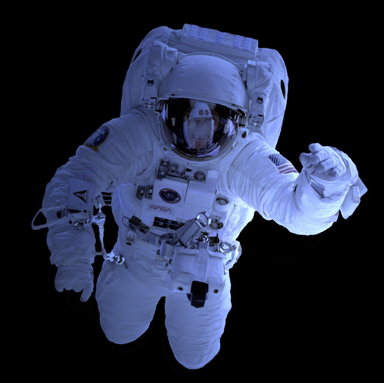 Astronauts are seen inside the International Space Station as they prepare to return to the station following a pause in air leak repairs in the Russian segment.