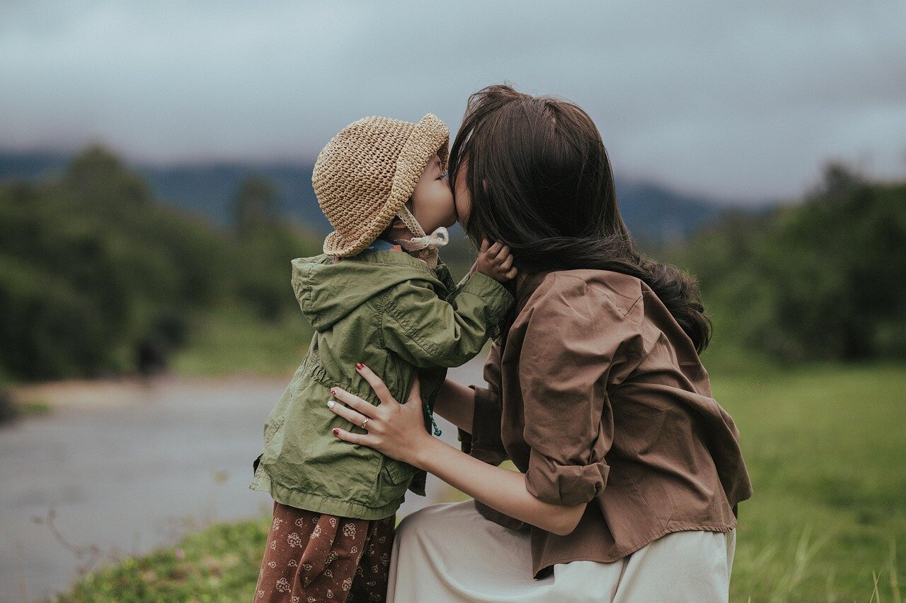 A group of parents participating in an online meeting, highlighting the collaborative efforts of working parents navigating remote work challenges together