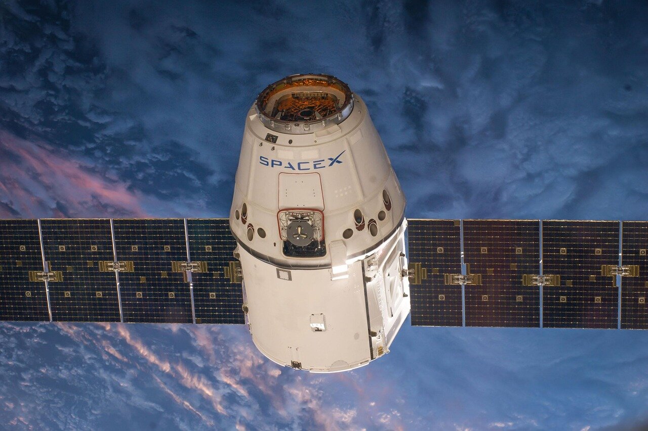 A historic moment captured as the Falcon 1 rocket successfully launches into orbit, symbolizing SpaceX's groundbreaking achievement in private space exploration