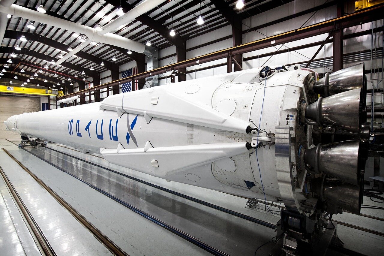 The Dragon spacecraft docking with the International Space Station, highlighting SpaceX's pioneering role in commercial space missions