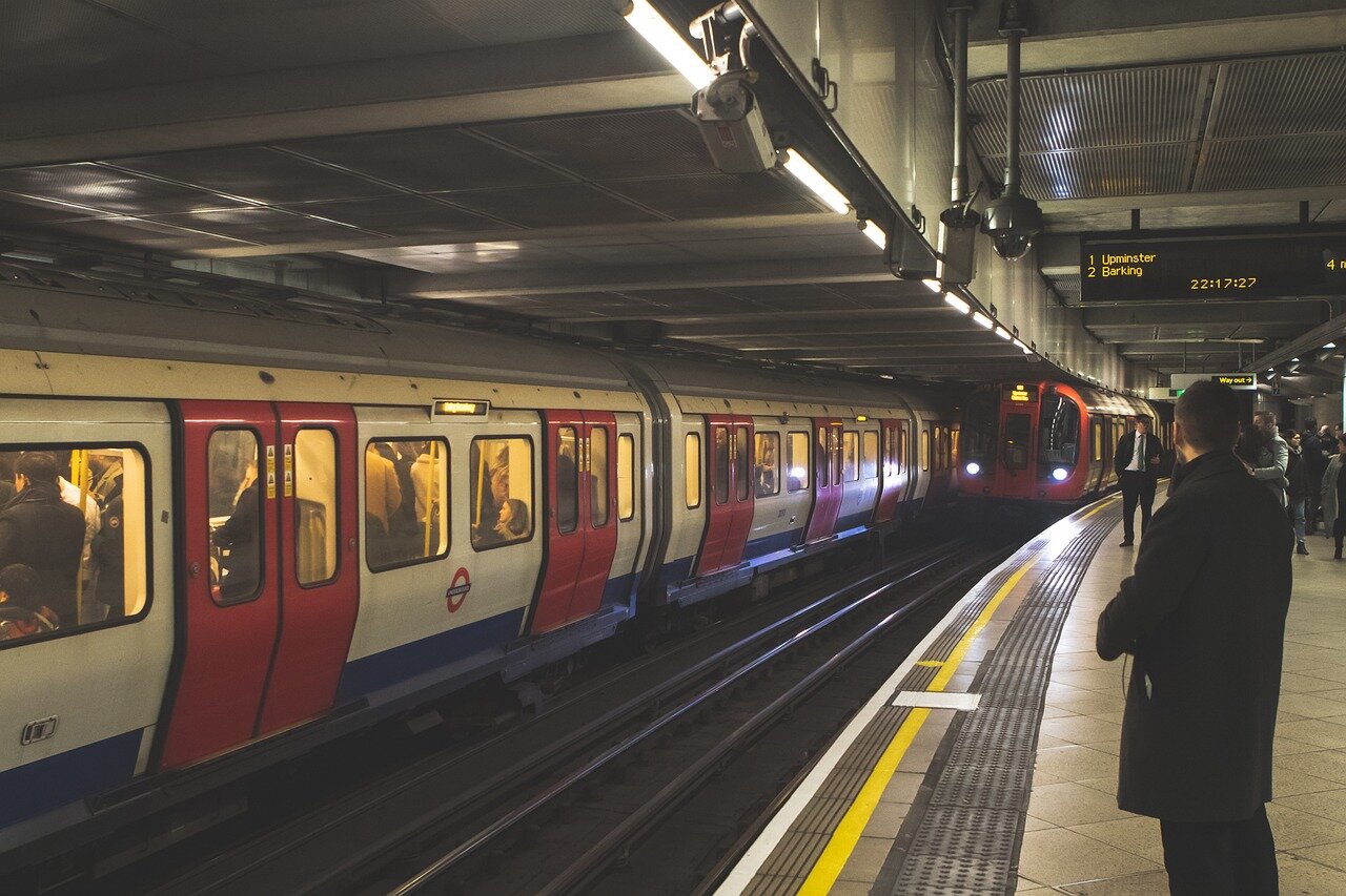 A group of teenagers is seen leaving a police station, highlighting their prior interactions with law enforcement before the recent cyberattack on Transport for London.