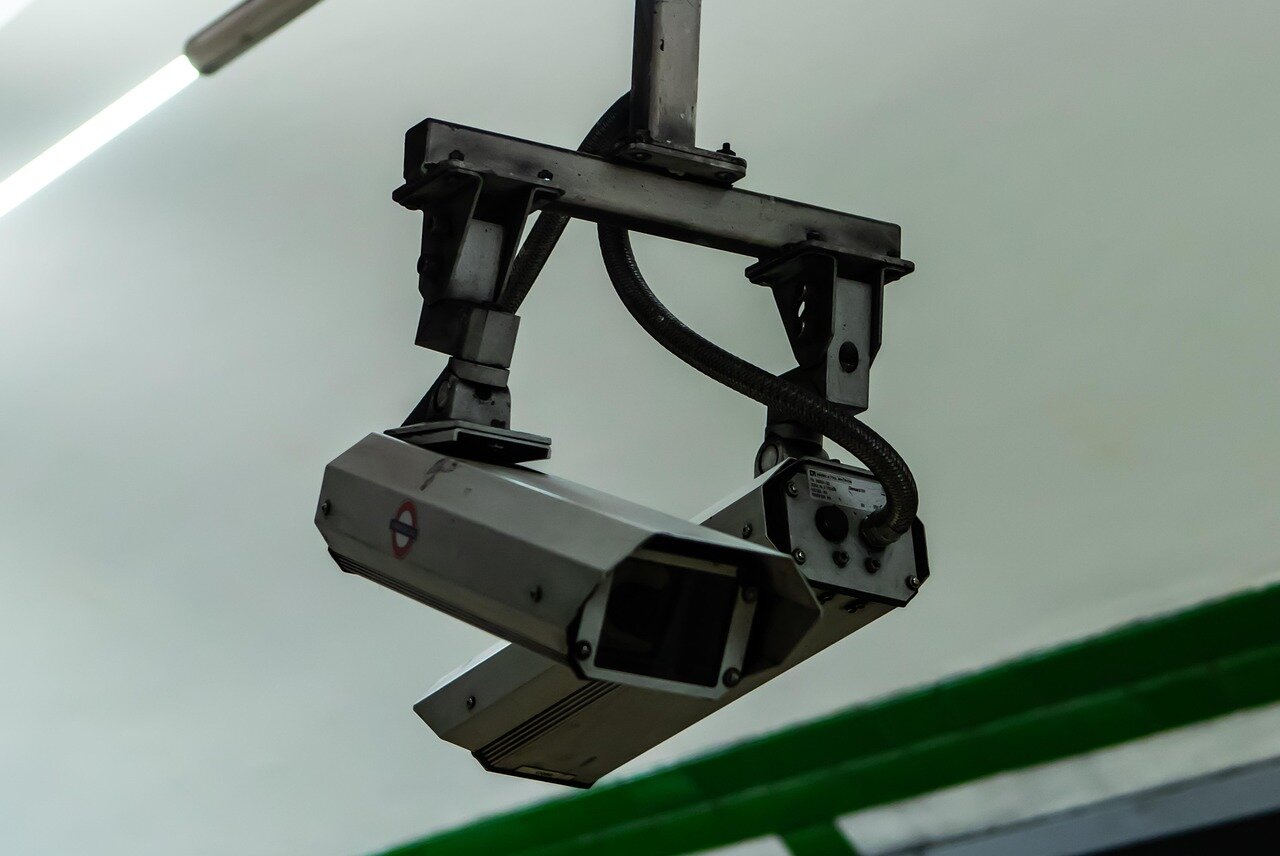 A closeup of a TfL sign, symbolizing the organization's commitment to safeguarding public trust and infrastructure amidst recent challenges