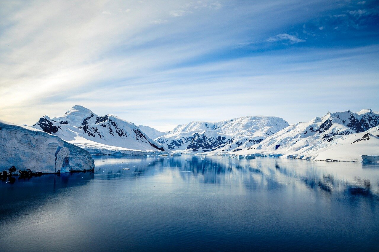 A scenic landscape of Antarctica, illustrating the harsh yet historically rich environment where the first dinosaur fossil was found