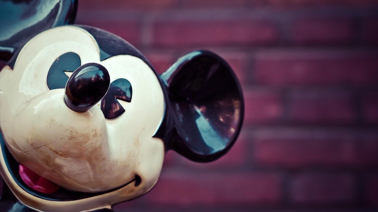 Executives from Disney and leading film producers engage in a discussion about the growing significance of local talent in the film industry during a conference.
