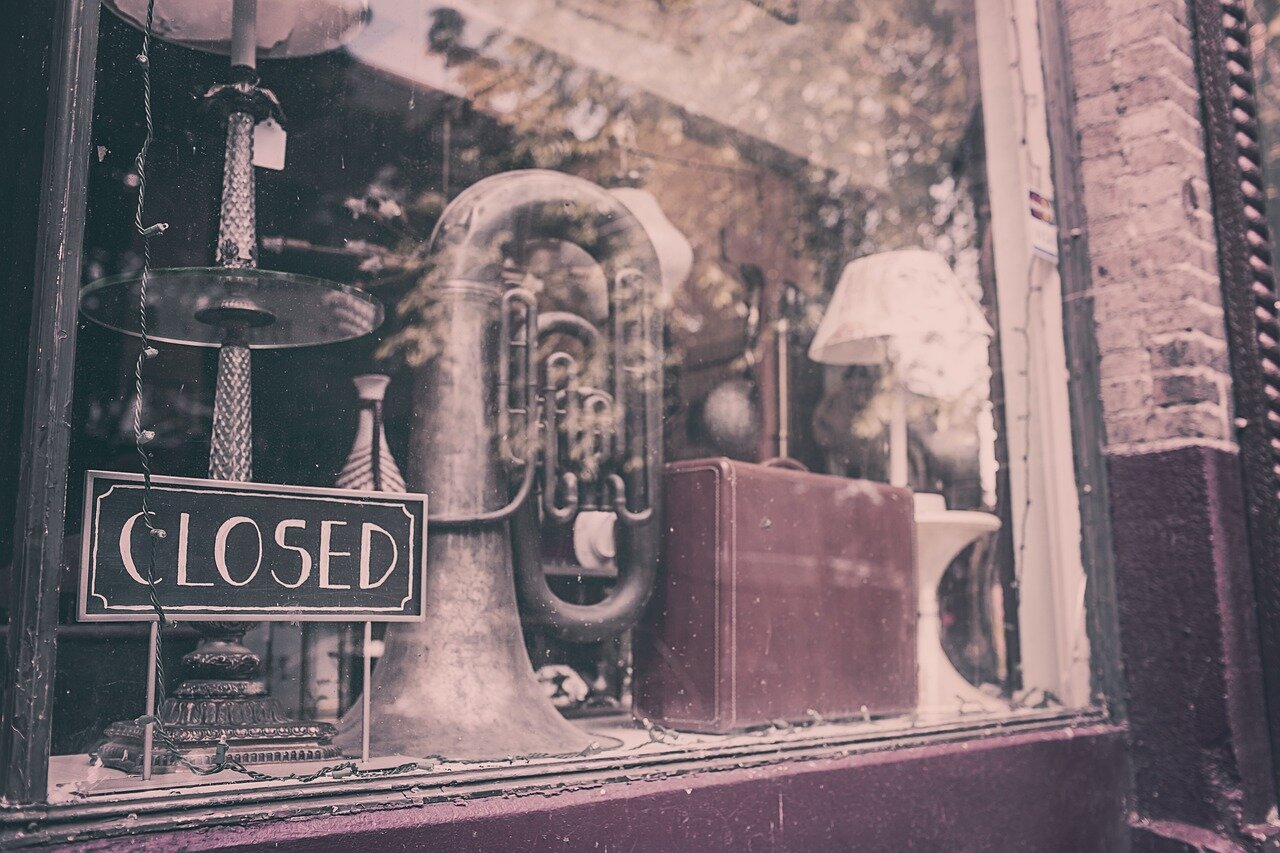 A bustling jazz venue filled with music lovers, representing the revitalization of live performances following the release of the band's latest work
