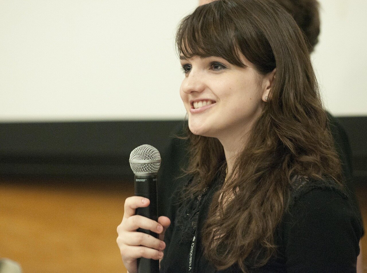 A concerned editor reviewing guidelines on a computer screen, reflecting the ongoing debates about censorship and editorial freedom on the platform